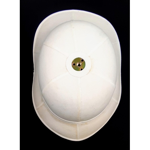 1166 - A Brand New Royal Marines Pith Helmet. No fittings - In bag.