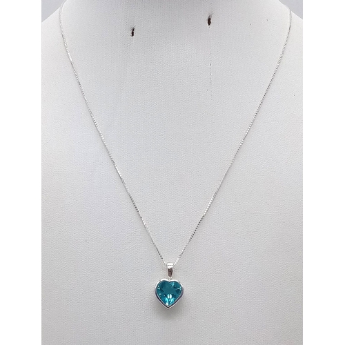 1156 - A Blue Topaz Heart Pendant on a Disappearing Silver Necklace. 10mm and 44cm