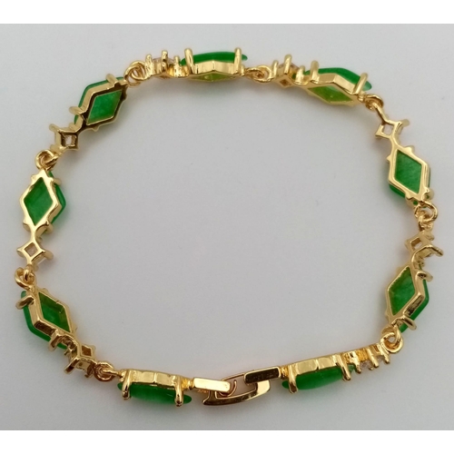 1176 - A Green and White Stone Gilded Bracelet. 19cm