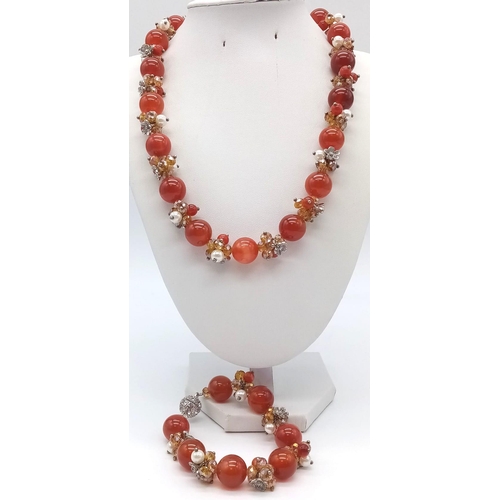 1189 - A Carnelian and Cultured Seed Pearl Necklace and Bracelet Set. Carnelian beads separated by smaller ... 