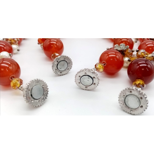 1189 - A Carnelian and Cultured Seed Pearl Necklace and Bracelet Set. Carnelian beads separated by smaller ... 