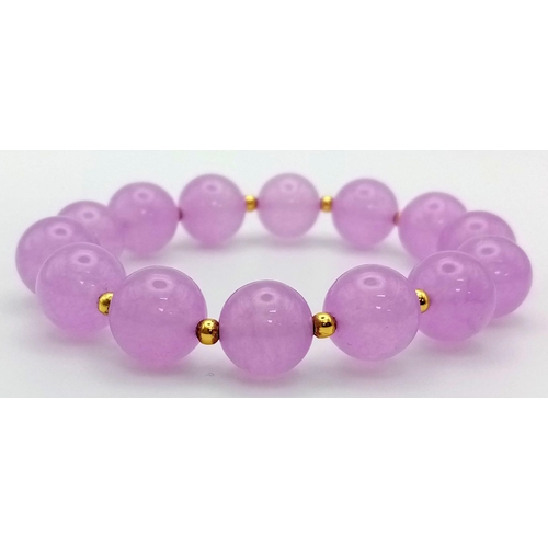 1197 - A Lavender Jade Beaded Bracelet. 12mm.