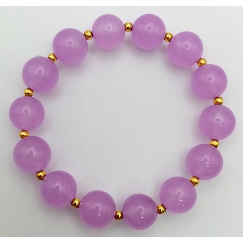 1197 - A Lavender Jade Beaded Bracelet. 12mm.