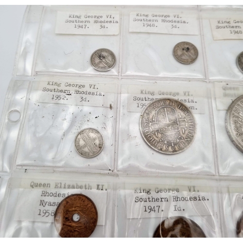 294 - A Collection of King George VI and Queen Elizabeth II Rhodesian Coins. Includes a 1953 Silver Crown.... 