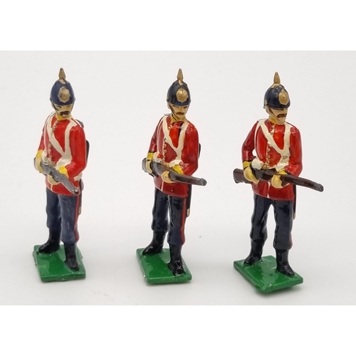 546 - A Vintage Set of Seven British Infantry 1900s Lead Soldiers.