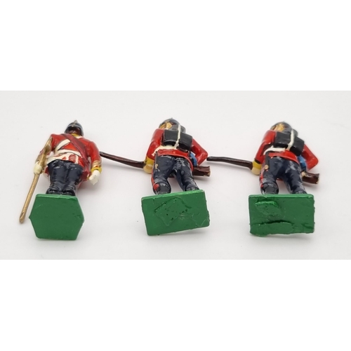 546 - A Vintage Set of Seven British Infantry 1900s Lead Soldiers.