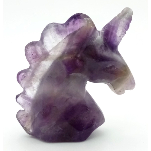 729 - A Fluorite Unicorn Figure. 6cm.