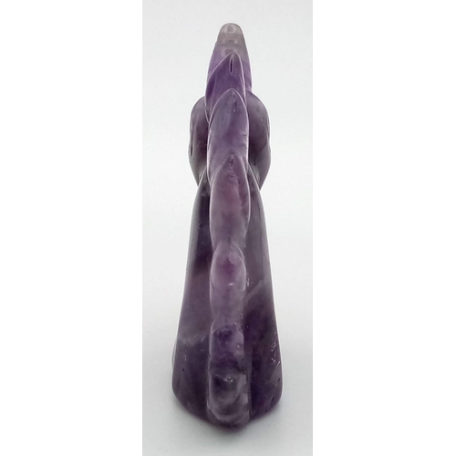 729 - A Fluorite Unicorn Figure. 6cm.