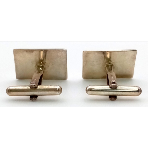 952 - A Pair of Silver Fred Bennett Cufflinks.