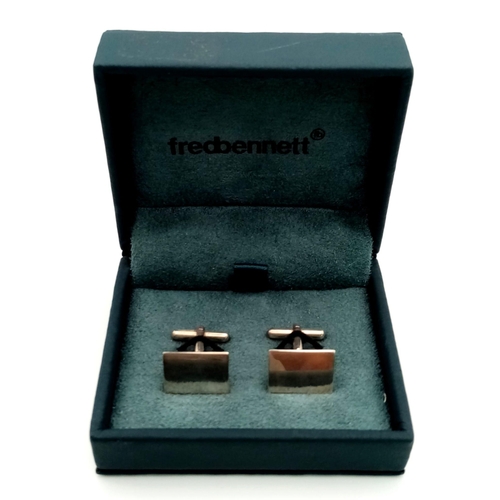 952 - A Pair of Silver Fred Bennett Cufflinks.