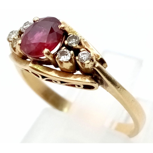 984 - A 14K Yellow Gold Ruby and Diamond Ring. Central ruby with three diamonds on either shoulder. Size M... 