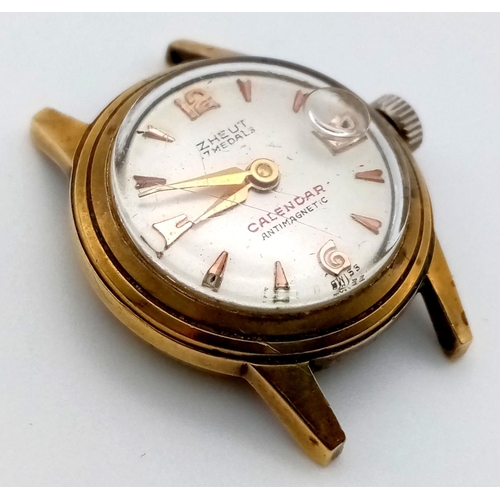 39 - An 18K Gold Cased Zheut Watch. Not in working order.
11.9g total case weight.