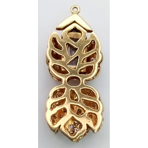 58 - An Antique 18K Yellow Gold Diamond and Pearl Pendant. Beautiful leaves of gold and diamonds connecte... 