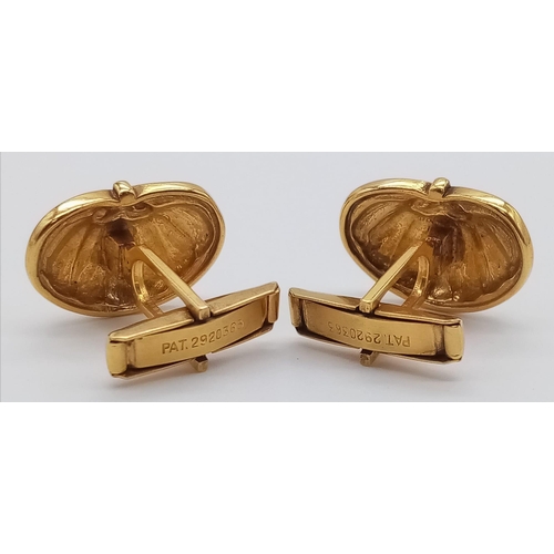 943 - A Vintage Pair of Gilded Clam Cufflinks.