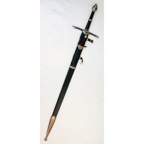 100 - The Very Collectible Lord of The Rings Sword of Strider with Scabbard. Solid metal cross guard and p... 