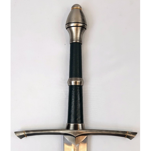 100 - The Very Collectible Lord of The Rings Sword of Strider with Scabbard. Solid metal cross guard and p... 