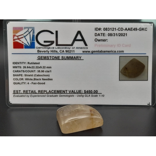 629 - A heavily rutilated quartz (35.90 carats) with GLA certificate. Dimensions: 26.64 x 22.22 x 9.22 mm.... 