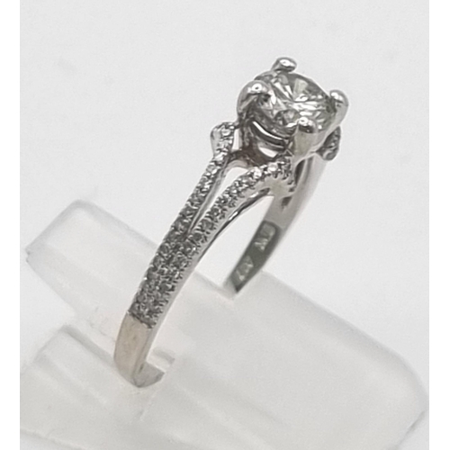 638 - 10K WHITE GOLD DIAMOND SOLITAIRE WITH DIAMOND SET SPLIT SHOULDERS 0.50CT CENTRE STONE 2.2G SIZE M