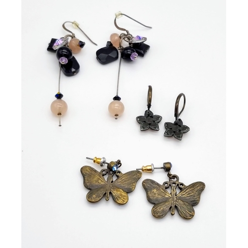 803 - SELECTION OF 10 PAIRS OF DROP EARRINGS.