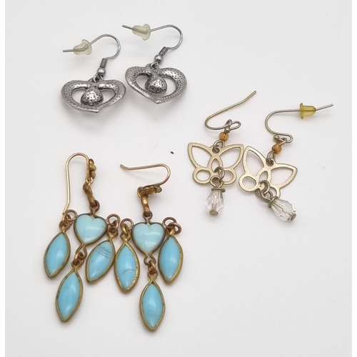 803 - SELECTION OF 10 PAIRS OF DROP EARRINGS.