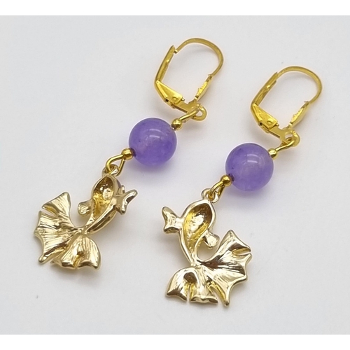 802 - A Pair of 18K Gold Plated Lavender Jade and Leaping Fish Lever-Back Earrings.