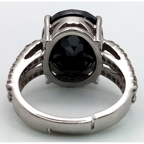 809 - 7ct Oval Black Moissanite Ring in 925 Silver with Rose Cut diamonds. Size N 1/2.