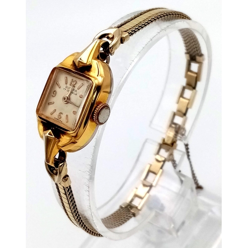 829 - A Vintage Bifora Gold Plated Ladies Watch. Case - 22 x 15mm. Mechanical movement in working order.