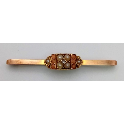 741 - AN ANTIQUE BAR BROOCH DECORATED WITH SEED PEARLS , CORAL AND A SINGLE DIAMOND.   3.3gms