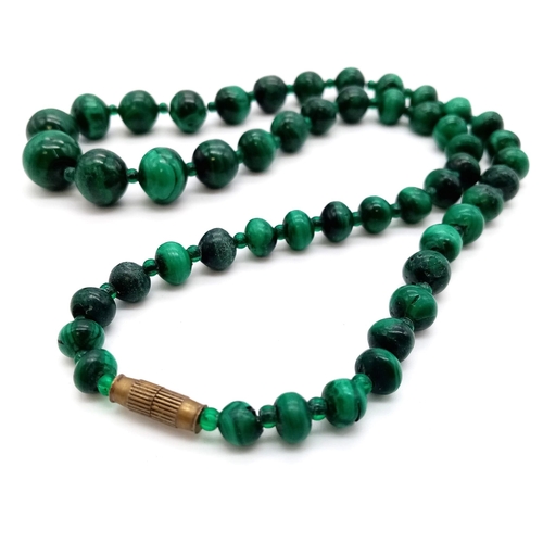 755 - A Vintage Graduated Green Bead Necklace with Barrel Clasp. 46cm.