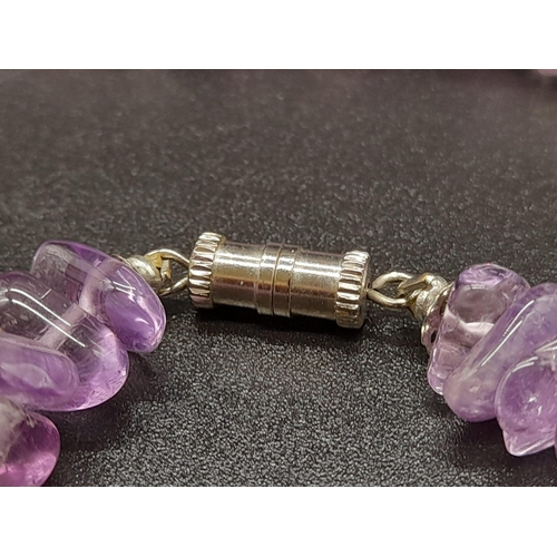 786 - A Mixed Bead-Type Amethyst Necklace. Barrel clasp.
54cm.