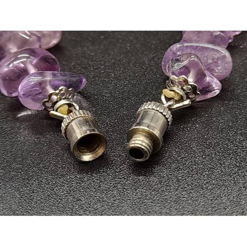 786 - A Mixed Bead-Type Amethyst Necklace. Barrel clasp.
54cm.