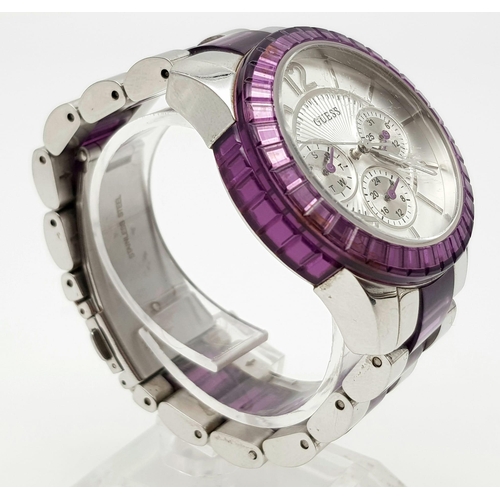 1165 - A Guess Chronograph Ladies Watch. Purple and steel strap and case - 40mm. Quartz movement in working... 