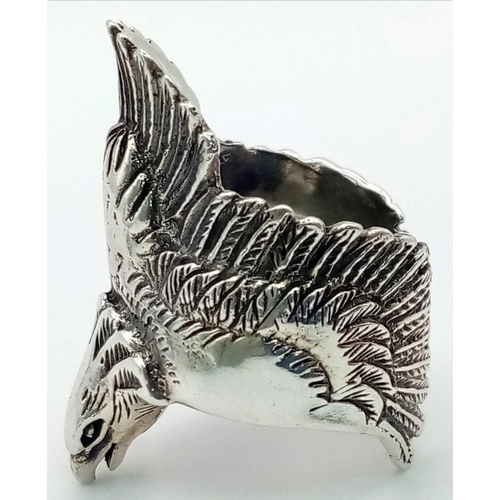 338 - A Solid Silver Open-Ended Eagle Ring. 12.62g. L-N.