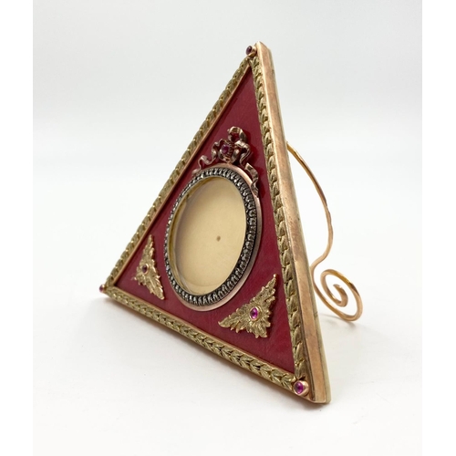 561 - A Russian 14K Yellow Gold Diamond and Enamel Gemset Triangular Picture Frame. 9cm each side. 
107g.