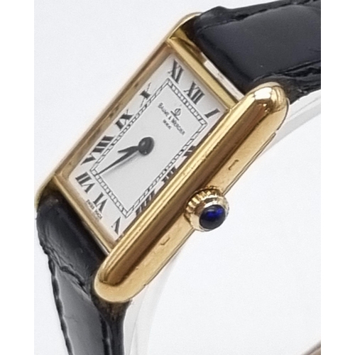 843 - A Baume and Mercier 18K Gold Ladies Tank Watch. Leather strap. 18K gold case - 27 x 22mm. Mechanical... 