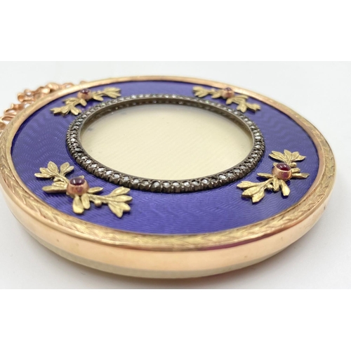 266 - A Russian 14K Yellow Gold Diamond and Enamel Gemset Picture Frame. 7.5cm diameter.
102g total weight... 