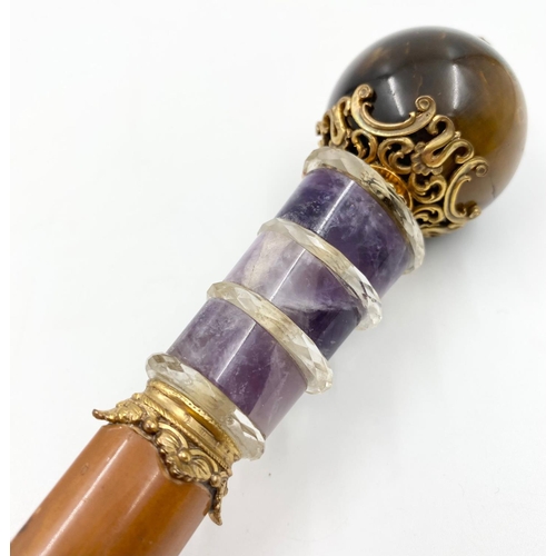 834 - An Antique Russian 14K Yellow Gold, Silver, Tigers Eye,
Diamond and Amethyst Parasol Handle. 27cm lo... 