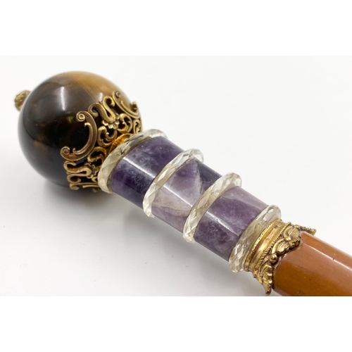 834 - An Antique Russian 14K Yellow Gold, Silver, Tigers Eye,
Diamond and Amethyst Parasol Handle. 27cm lo... 