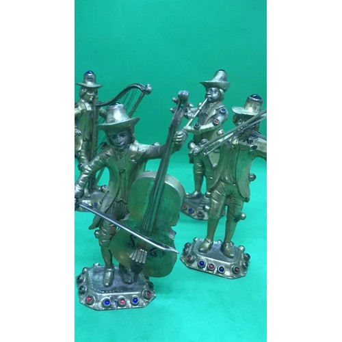 429 - Antique 19th century German rare set of solid silver gem set musicians

Each figure is 11.4 to 12cm ... 