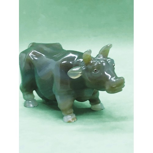 422 - A Russian early carved agate cow/bull figure set with gold and ruby eyes 
Width 10.5cm
Height to hor... 