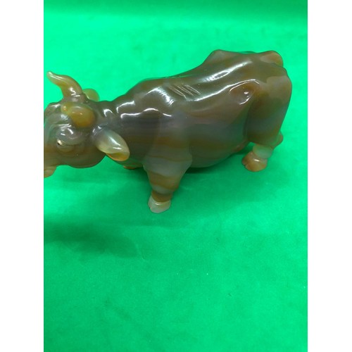 422 - A Russian early carved agate cow/bull figure set with gold and ruby eyes 
Width 10.5cm
Height to hor... 