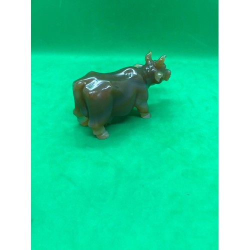 422 - A Russian early carved agate cow/bull figure set with gold and ruby eyes 
Width 10.5cm
Height to hor... 