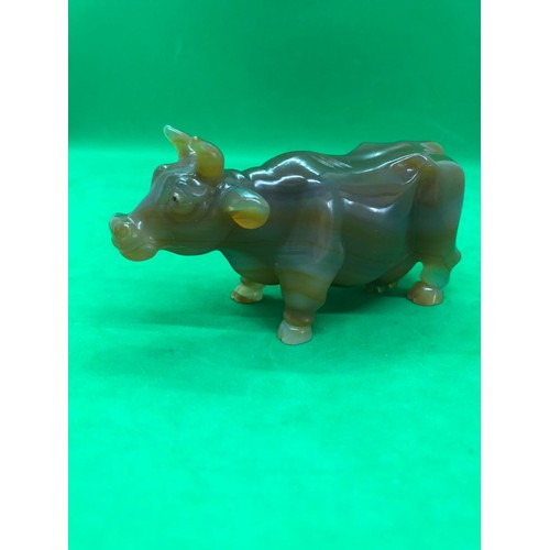 422 - A Russian early carved agate cow/bull figure set with gold and ruby eyes 
Width 10.5cm
Height to hor... 