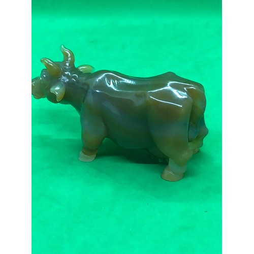 422 - A Russian early carved agate cow/bull figure set with gold and ruby eyes 
Width 10.5cm
Height to hor... 