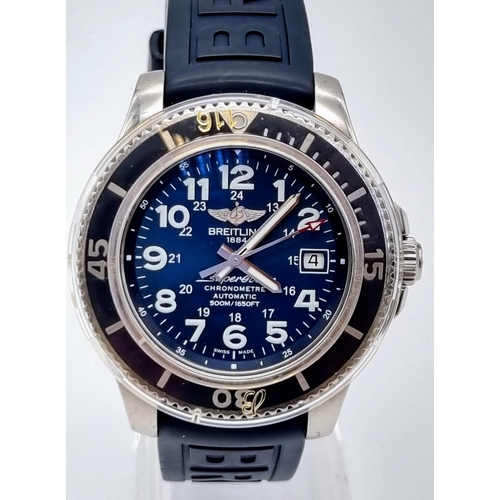 11 - A Breitling Super Ocean Chronometer Gents Watch. Blue rubber strap. Stainless steel case -41mm. Blue... 