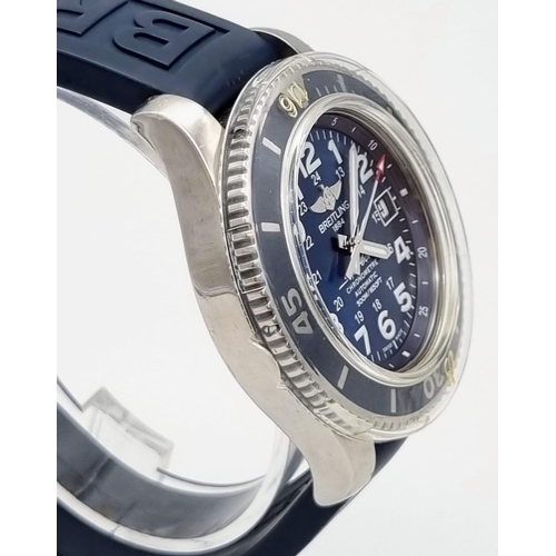 11 - A Breitling Super Ocean Chronometer Gents Watch. Blue rubber strap. Stainless steel case -41mm. Blue... 