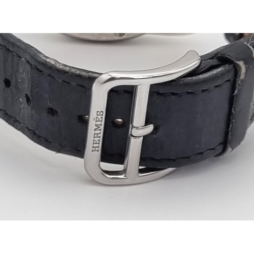 33 - A Hermes Arceau Gents Quartz Watch. Black leather strap. Stainless steel case - 38mm. Anthracite dia... 