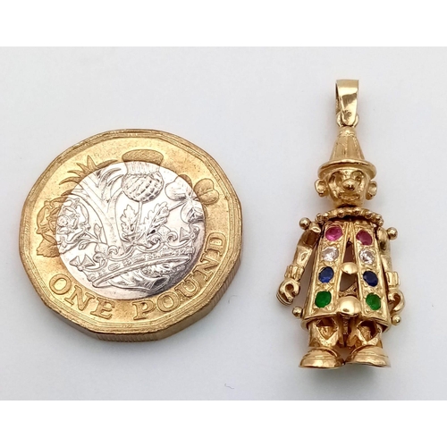 12 - A 9 K yellow gold cute clown pendant/charm set with precious stones. Height: 30 mm, weight: 3.8 g.