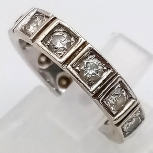 171 - An 18K White Gold Eternity Diamond Ring. 0.48ct of round cut diamonds. Size K. 4.7g total weight. Re... 