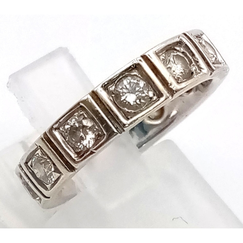 171 - An 18K White Gold Eternity Diamond Ring. 0.48ct of round cut diamonds. Size K. 4.7g total weight. Re... 